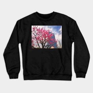 Skyscraper behind a cherry blossom in Tokyo Crewneck Sweatshirt